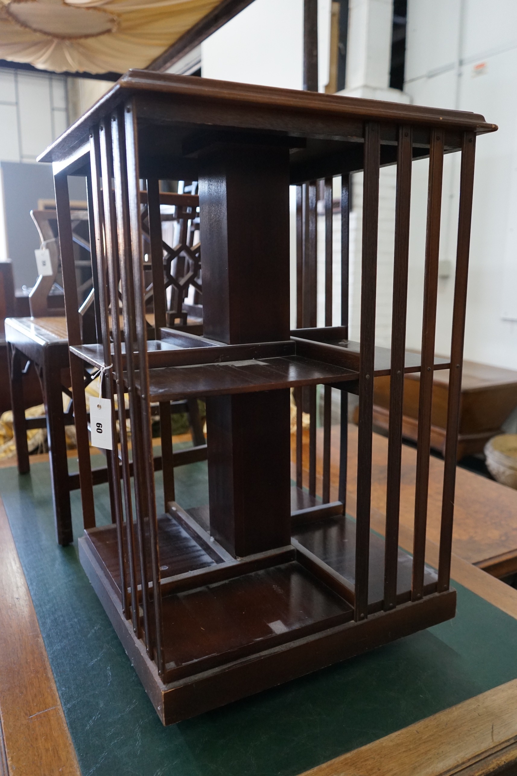 An Edwardian style mahogany revolving bookcase, width 50cm, height 78cm